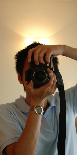 man-taking-selfie-with-camera